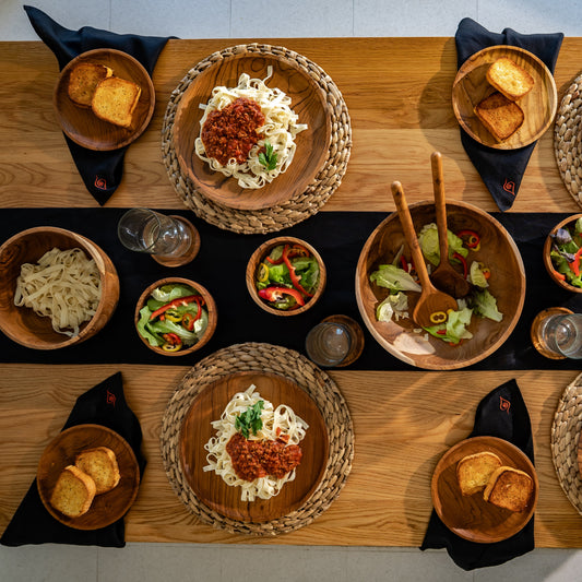 These hand-sown black napkins are lightweight, breathable and beautifully textured. Each napkin tells a story of thoughtful craftsmanship and sustainable living. Dimensions - 43cm x 43cm.