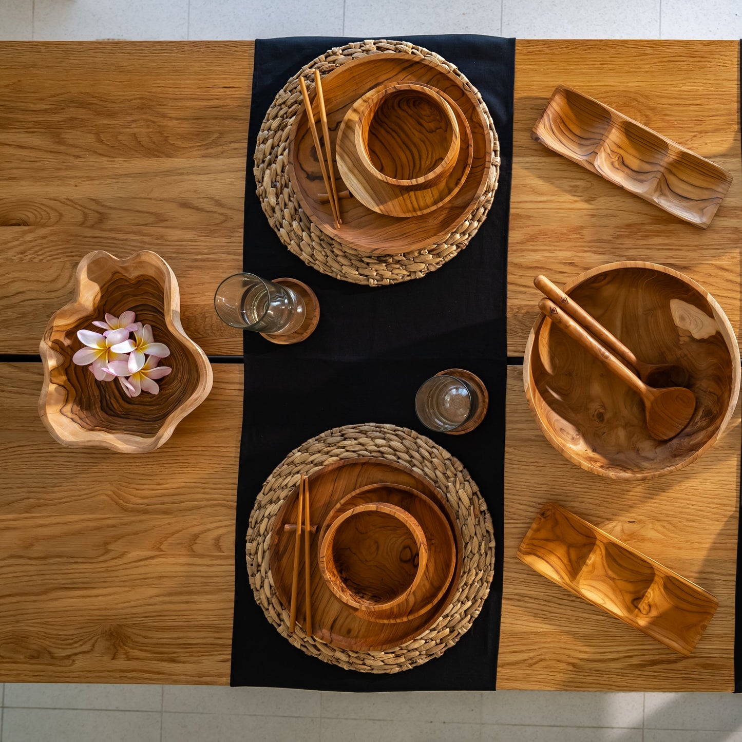 A uniquely shaped bowl, hand-carved from sustainable teak root. Each bowl tells its own story through its intricate grain patterns and organic shape. Perfect for holding fruit, decorative accents, knick-knacks or standing alone as a statement piece. High quality, stylish and durable. Dimensions: 30cm x 25cm x 8cm