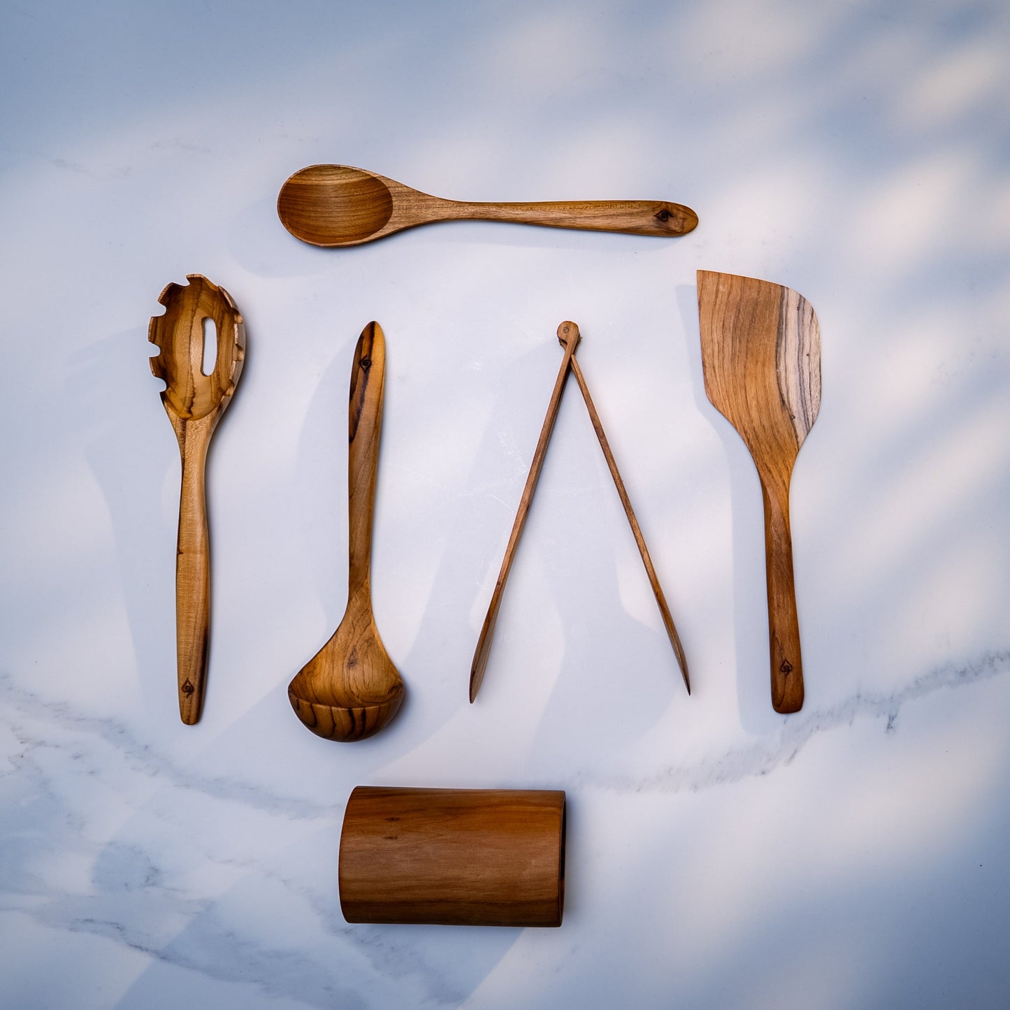 Kitchen Utensil Set is the perfect kitchen sidekick, bringing together five beautifully crafted, high quality, sustainable teak tools for every culinary adventure.
Spatula: 31.5cm x 8.5cm
Wooden Spoon: 30cm x 6cm x 2cm
Spaghetti Server: 31cm x 7cm x 4cm
Tongs: 22cm x 7cm x 3cm
Ladle: 31cm x 4cm x 10cm
Utensil Holder: 14cm x 9cm