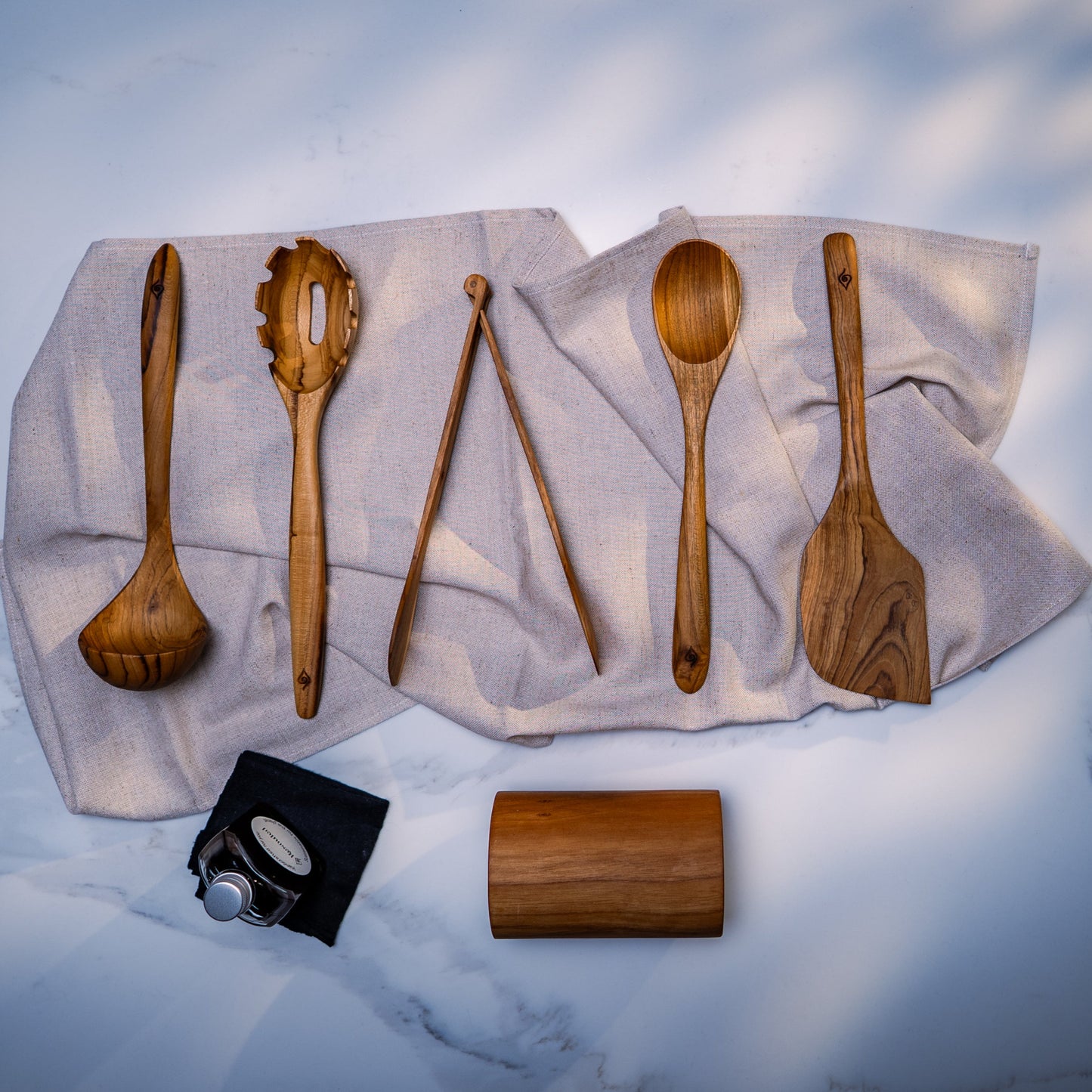 Kitchen Utensil Set is the perfect kitchen sidekick, bringing together five beautifully crafted, high quality, sustainable teak tools for every culinary adventure.
Spatula: 31.5cm x 8.5cm
Wooden Spoon: 30cm x 6cm x 2cm
Spaghetti Server: 31cm x 7cm x 4cm
Tongs: 22cm x 7cm x 3cm
Ladle: 31cm x 4cm x 10cm
Utensil Holder: 14cm x 9cm