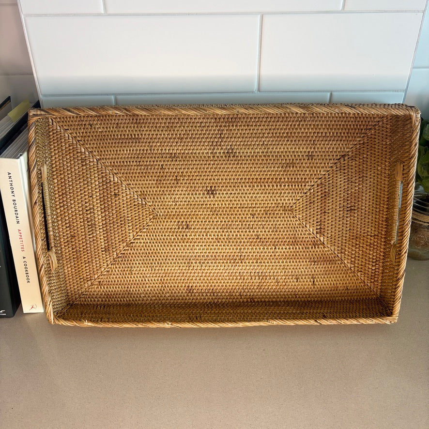 Rectangle-shaped rattan tray with sturdy handles and a lightweight build. Great for serving as it’s easy to carry and versatile. 50cm x 30cm x 7cm