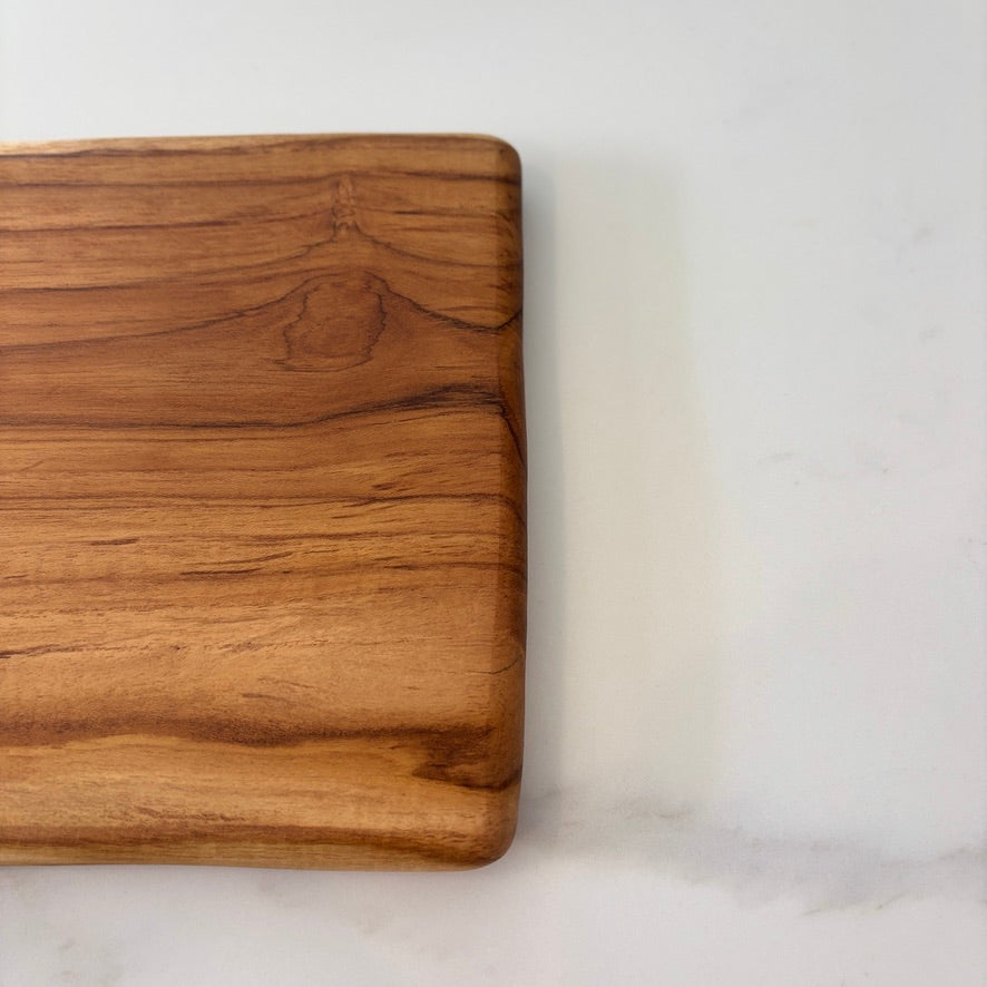 This durable sleek teak charcuterie board is a masterpiece and is designed for serving bold, adventurous spreads.
60cm x 18cm x 1.5cm