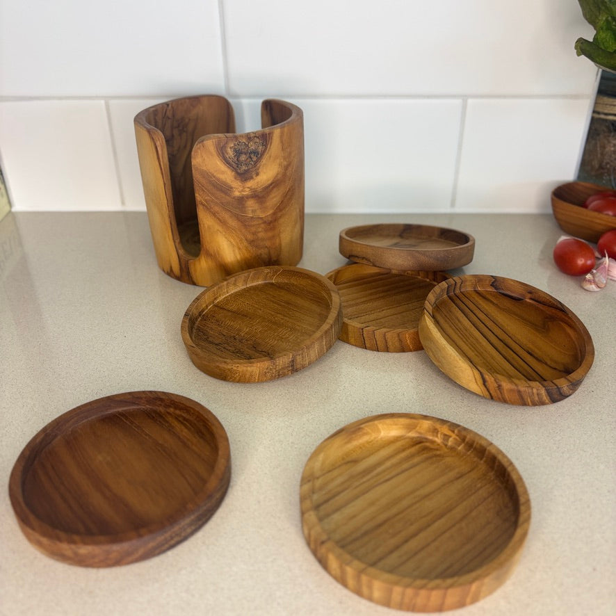 Handcrafted from sustainable teak root, each coaster in this set of 6 is a unique slice of nature, designed to catch drips and spills.
Coaster: 10cm x 1.5cm
Holder: 12cm x 10.5cm