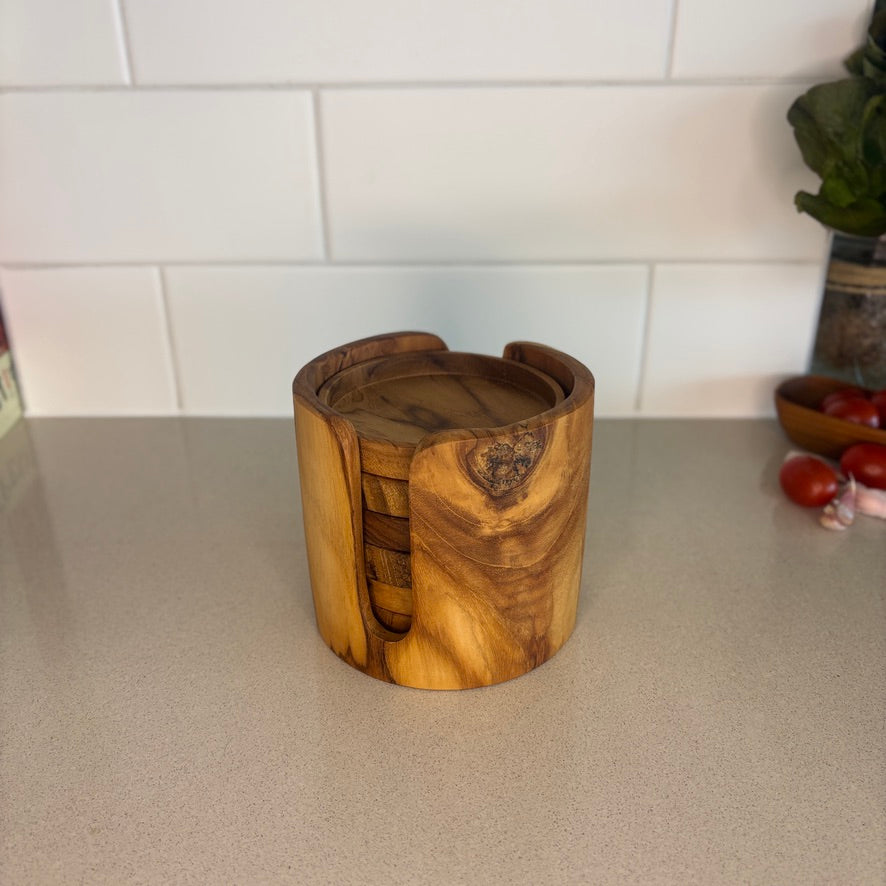 Handcrafted from sustainable teak root, each coaster in this set of 6 is a unique slice of nature, designed to catch drips and spills.
Coaster: 10cm x 1.5cm
Holder: 12cm x 10.5cm