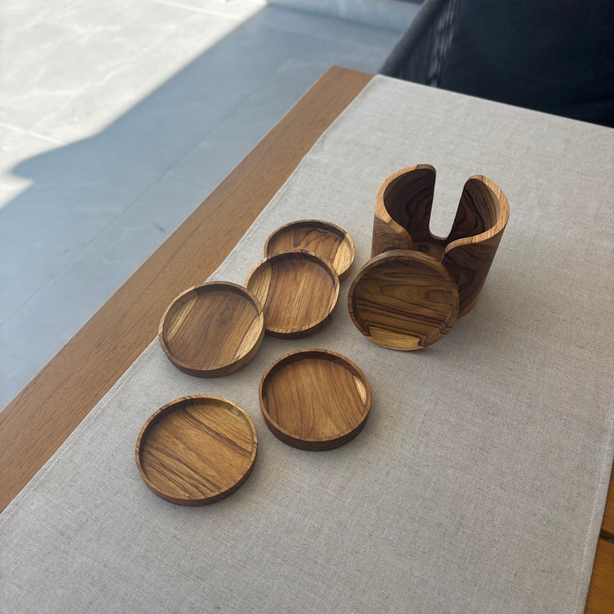 Handcrafted from sustainable teak root, each coaster in this set of 6 is a unique slice of nature, designed to catch drips and spills.
Coaster: 10cm x 1.5cm
Holder: 12cm x 10.5cm