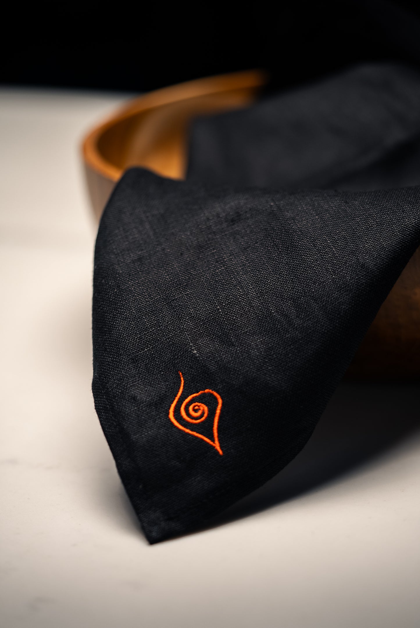 These hand-sown black napkins are lightweight, breathable and beautifully textured. Each napkin tells a story of thoughtful craftsmanship and sustainable living. Dimensions - 43cm x 43cm.