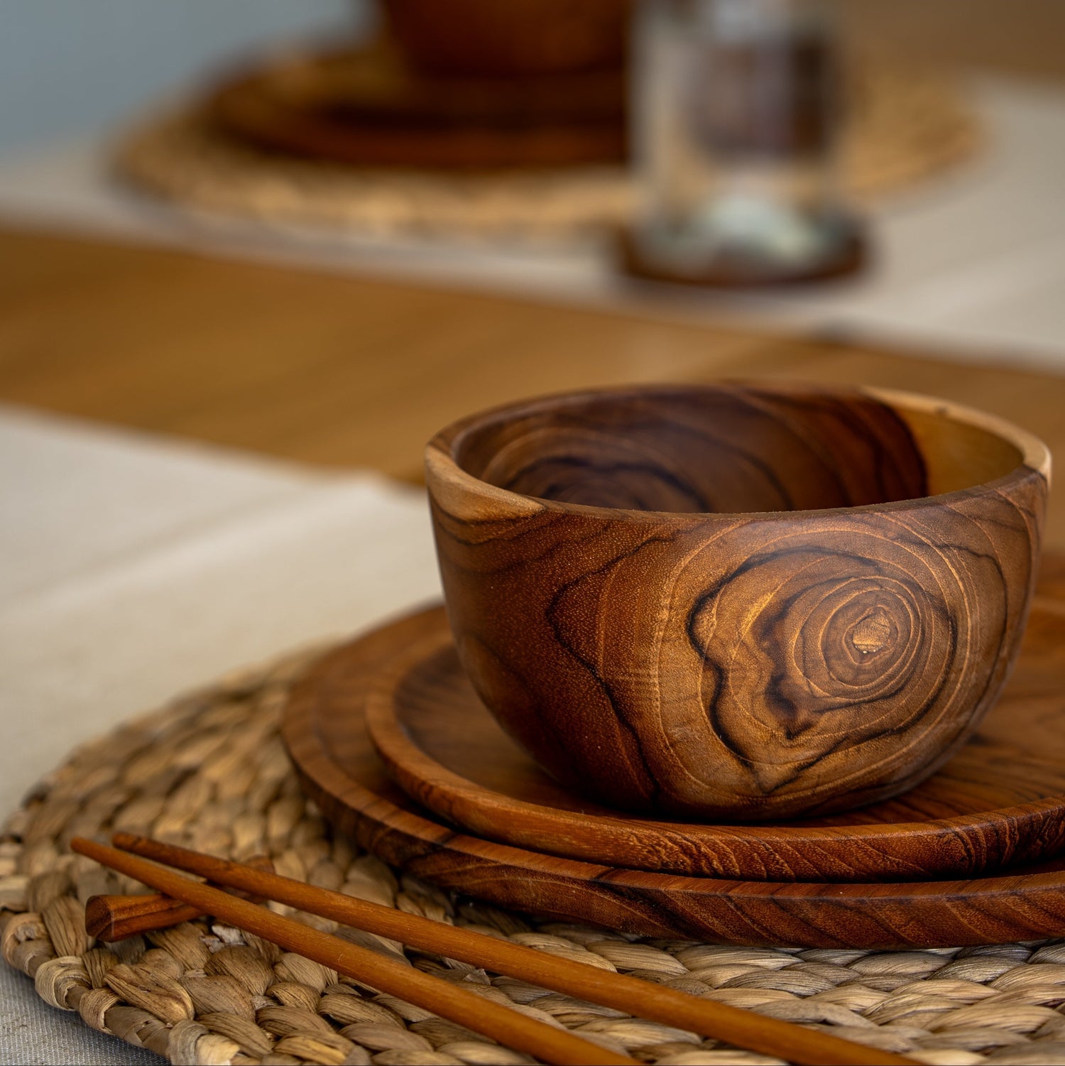 mages shows a stunning trio of handcrafted pieces, comprising a larger plate (28cm x 2cm), smaller plate (20cm x 1.5cm) and a bowl (14cm x 8cm). All pieces are handcrafted from sustainable teak and are as durable as they are stylish.