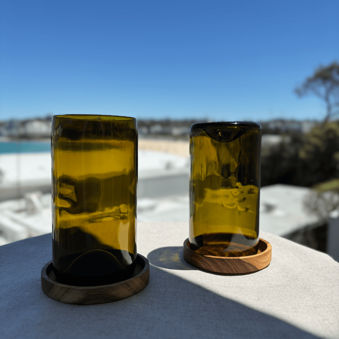 Image of two 600ml up-cycled glass tumblers in green colour, durable and dishwasher safe.