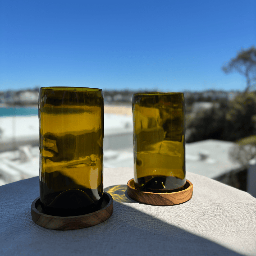Image of two 600ml up-cycled glass tumblers in green colour, durable and dishwasher safe.