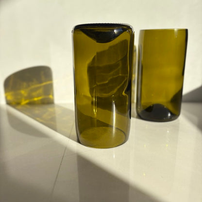 Image of two 600ml up-cycled glass tumblers in green colour, durable and dishwasher safe.