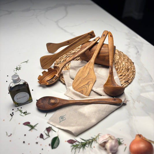 Kitchen Utensil Set is the perfect kitchen sidekick, bringing together five beautifully crafted, high quality, sustainable teak tools for every culinary adventure. 
Spatula: 31.5cm x 8.5cm
Wooden Spoon: 30cm x 6cm x 2cm
Spaghetti Server: 31cm x 7cm x 4cm
Tongs: 22cm x 7cm x 3cm
Ladle: 31cm x 4cm x 10cm
Utensil Holder: 14cm x 9cm
FREE 100ml bottle of Hemp Oil