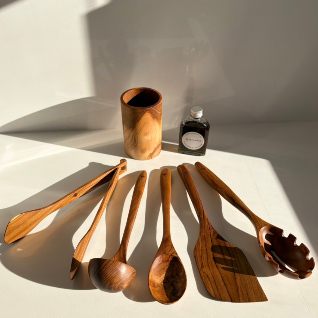 Kitchen Utensil Set is the perfect kitchen sidekick, bringing together five beautifully crafted, high quality, sustainable teak tools for every culinary adventure. 
Spatula: 31.5cm x 8.5cm
Wooden Spoon: 30cm x 6cm x 2cm
Spaghetti Server: 31cm x 7cm x 4cm
Tongs: 22cm x 7cm x 3cm
Ladle: 31cm x 4cm x 10cm
Utensil Holder: 14cm x 9cm
FREE 100ml bottle of Hemp Oil