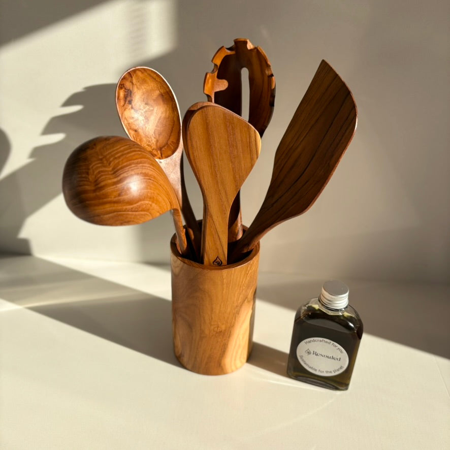 Kitchen Utensil Set is the perfect kitchen sidekick, bringing together five beautifully crafted, high quality, sustainable teak tools for every culinary adventure. 
Spatula: 31.5cm x 8.5cm
Wooden Spoon: 30cm x 6cm x 2cm
Spaghetti Server: 31cm x 7cm x 4cm
Tongs: 22cm x 7cm x 3cm
Ladle: 31cm x 4cm x 10cm
Utensil Holder: 14cm x 9cm
FREE 100ml bottle of Hemp Oil
