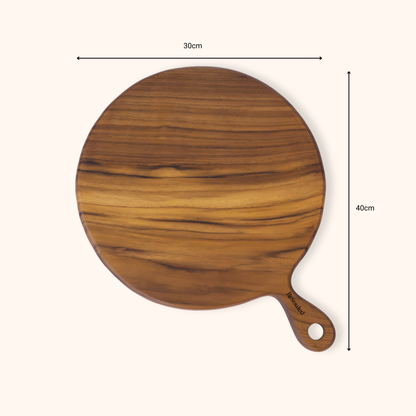 Round teak wooden pizza serving board with a handle, shown on a light beige background with dimension lines indicating 30 cm width and 40 cm height. The board has a warm medium-brown wood grain and a small engraved brand name on the handle.