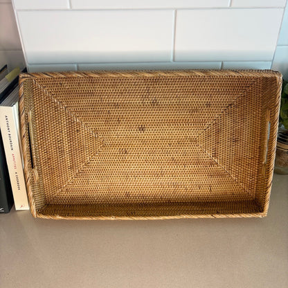 Rectangle-shaped rattan tray with sturdy handles and a lightweight build. Great for serving as it’s easy to carry and versatile. 50cm x 30cm x 7cm