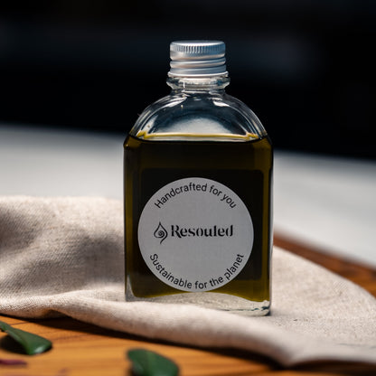 100ml bottle of 100% natural, food safe hemp seed oil in recyclable glass packaging with hemp cloth for application 
