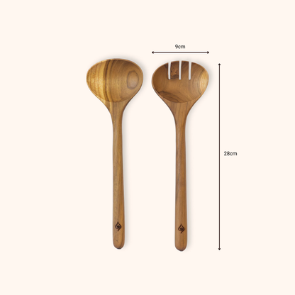 Two teak serving utensils, a soup spoon and a salad fork, shown on a light cream background with dimension lines indicating 9 cm width and 28 cm height.