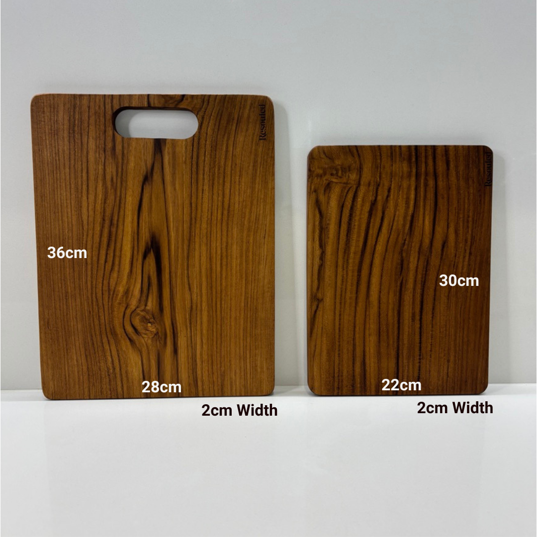Image showing set of 2 teak chopping boards and dimensions vs competitor wood fibre board, highlighting plastic-free materials, knife-friendliness, and natural sustainability.