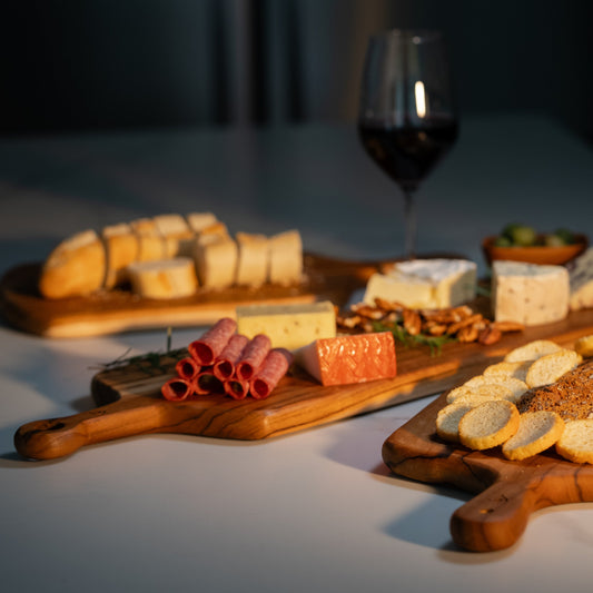 This durable sleek teak charcuterie board is a masterpiece and is designed for serving bold, adventurous spreads. 
60cm x 18cm x 1.5cm