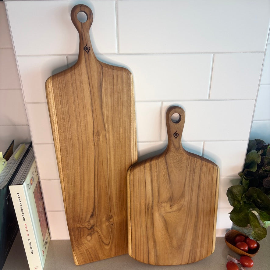 This durable sleek teak charcuterie board is a masterpiece and is designed for serving bold, adventurous spreads. 
60cm x 18cm x 1.5cm