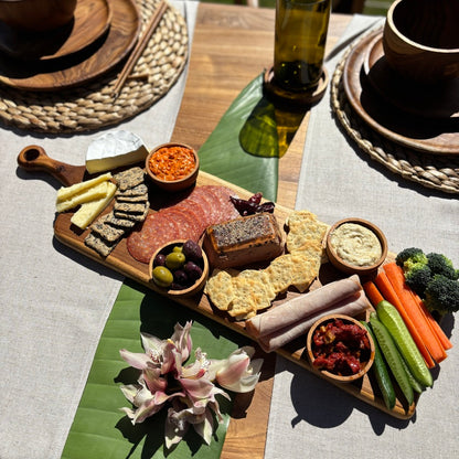 This durable sleek teak charcuterie board is a masterpiece and is designed for serving bold, adventurous spreads. 
60cm x 18cm x 1.5cm