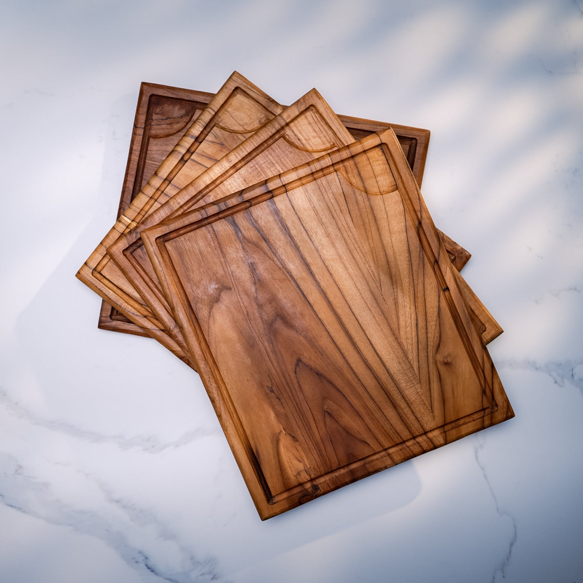 Tough, durable, and naturally beautiful. Built-in grooves capture liquids and keep your countertop clean
40cm x 35cm x 2cm