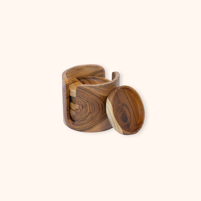A set of six wooden coasters and holder, crafted from teak wood with a prominent dark and light grain pattern, displayed on a solid off-white background.