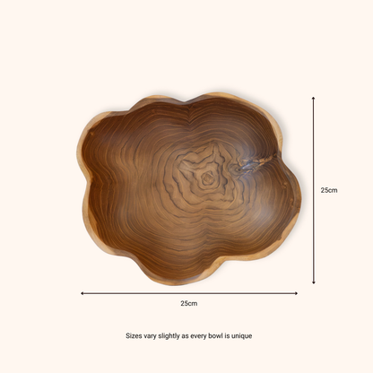 A scalloped-edge teak wooden bowl with a natural tree-ring pattern, shown with dimension lines indicating a height and width of 25cm on a light cream background.